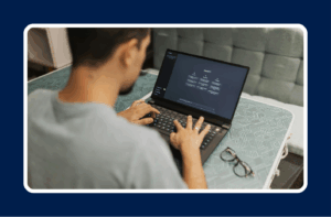 Person using a laptop with ChatGPT open, representing AI upskilling to future proof your career.