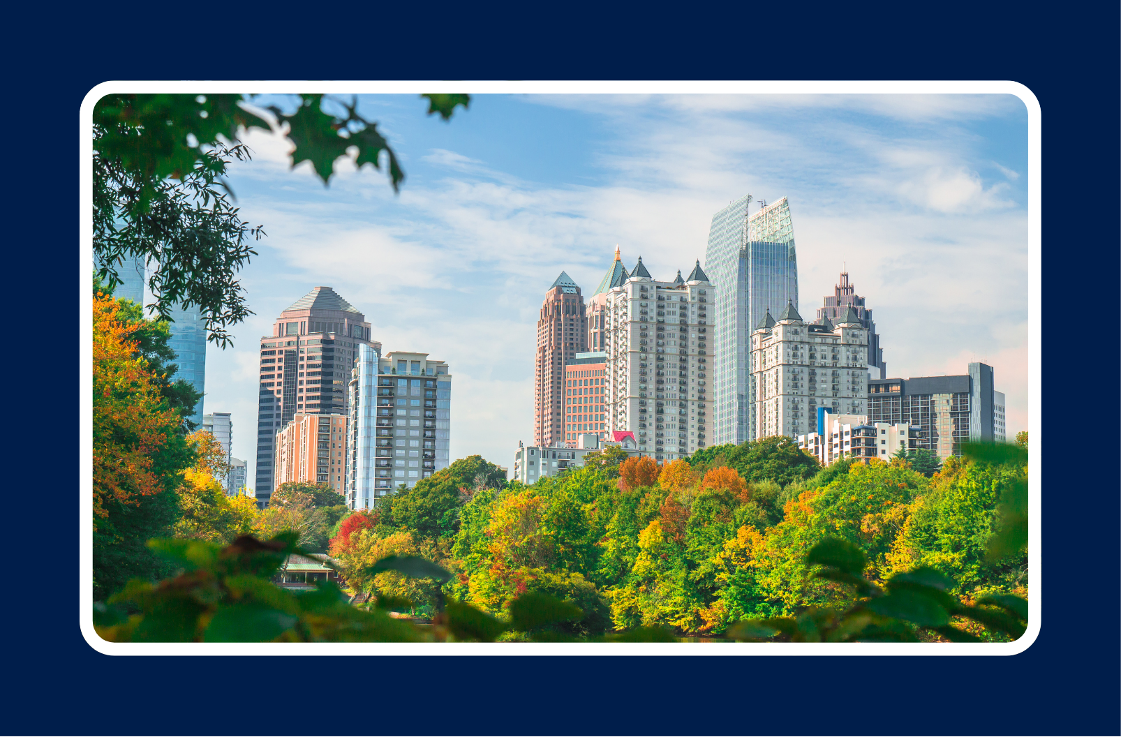 Downtown Atlanta skyline with trees in the foreground, reflecting hiring tech talent in Atlanta.