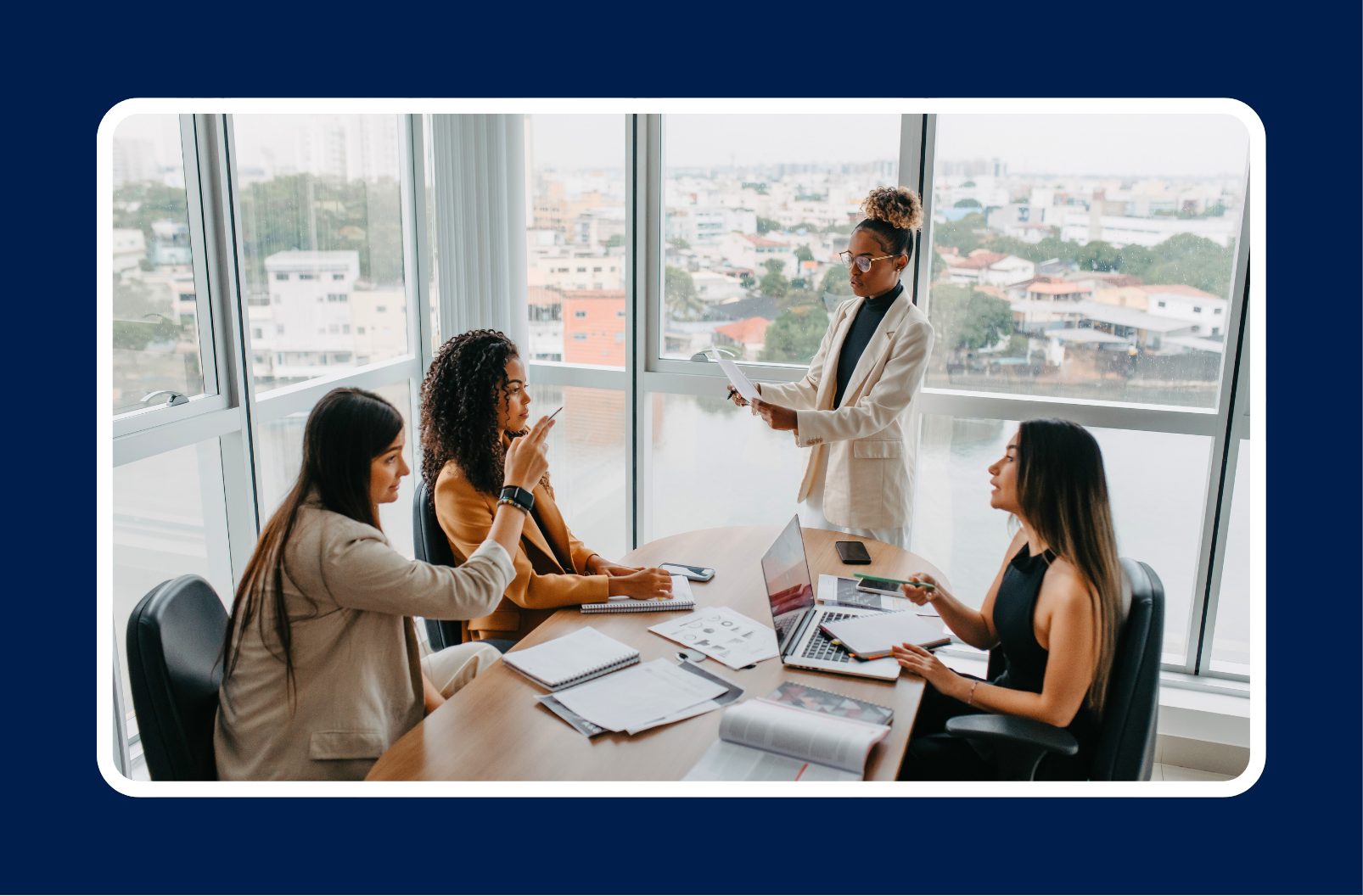 Executive team meeting in a modern office discussing CIO digital transformation strategy and business modernization plans.