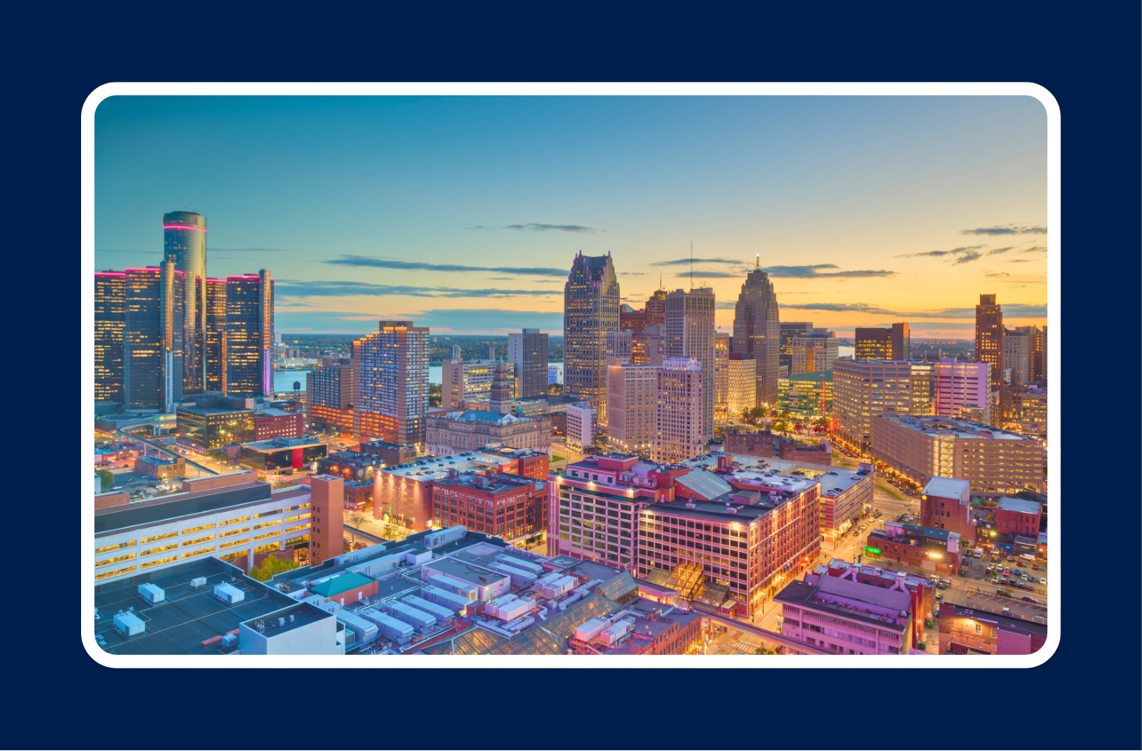 Detroit skyline at sunset representing the growth of software hiring in Detroit’s automotive and mobility sector.