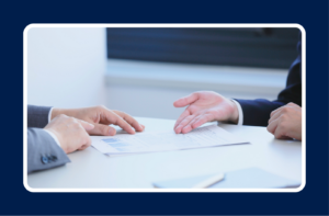 Professionals reviewing a tech compensation offer including salary, equity, and bonuses