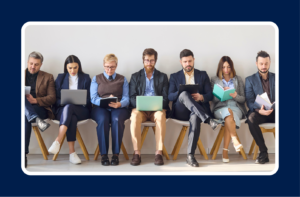 group of job candidates waiting for interviews, representing the decision on hiring for potential vs. experience in tech recruiting