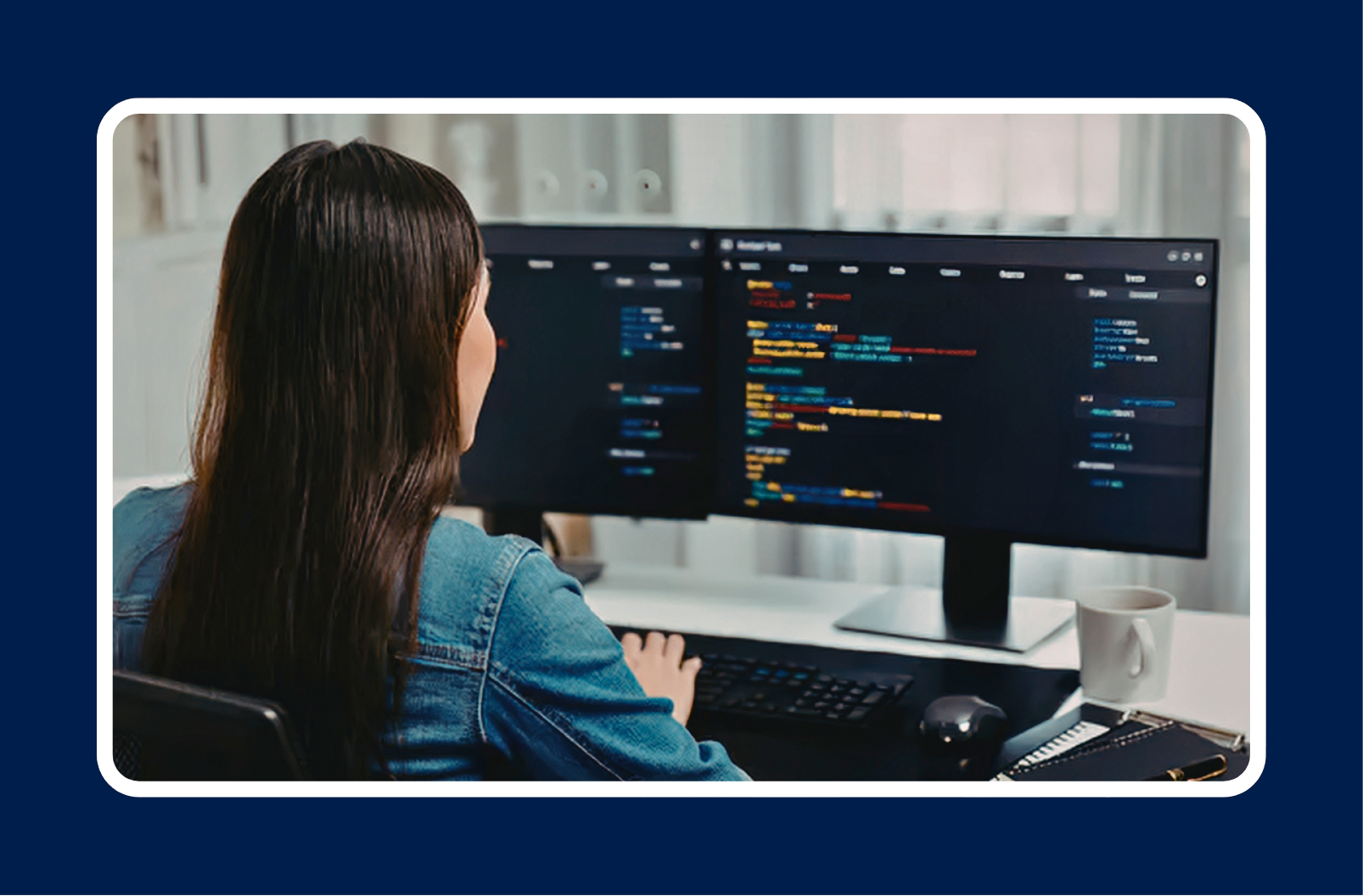 software engineer reviewing developer portfolio projects on dual monitor setup