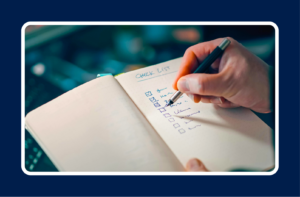 Professional writing a checklist to learn how to prioritize tasks at work when managing competing priorities.